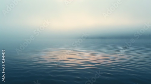 Dawn of a foggy evening waterscape