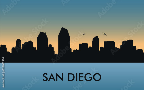San Diego. The city skyline. Silhouettes of buildings. The sunset of the day. Vector on a blue background	