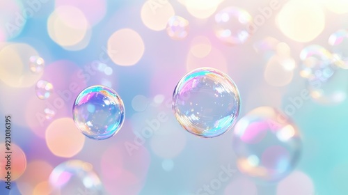 Closeup of iridescent soap bubbles against a soft pastel background.