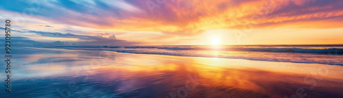 A beach during a vibrant sunset.