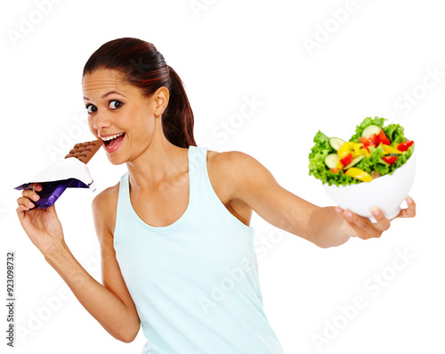 Chocolate, salad and portrait of woman in studio for healthy eating, wellness and nutrition. Decision, diet option and isolated happy person with vegetables, food and candy on white background