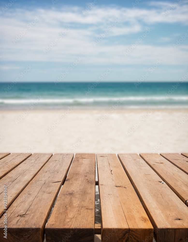 Empty wooden table with blurred beach with coconut trees in the background Empty wooden table with blurred beach with coconut trees in the background