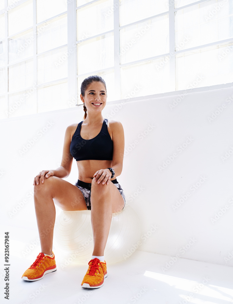 Smile, woman and relax on exercise ball in gym for fitness balance, core training and performance support. Female athlete, aerobic equipment for sport stability, break challenge and workout studio Smile, woman and relax on exercise ball in gym for fitness balance, core training and performance support. Female athlete, aerobic equipment for sport stability, break challenge and workout studio