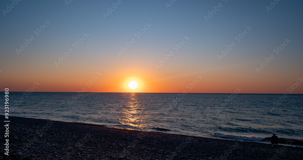 Sunset on the sea coast. Seascape orange sunset. Sunset on the sea coast. Seascape orange sunset.