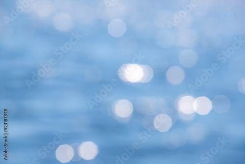 Bokeh abstract blue water background.