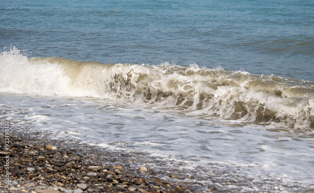 Seashore, small stones, sea wave. Marine background. Seashore, small stones, sea wave. Marine background.