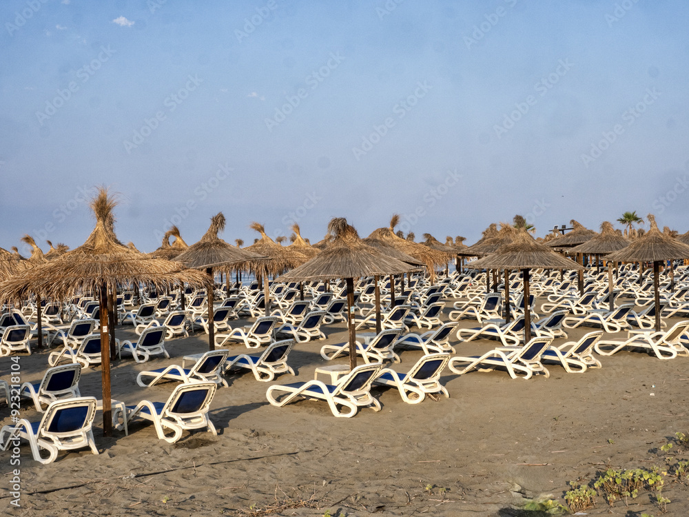 In the morning, there are empty sunbeds on the beach of Černá Hora.