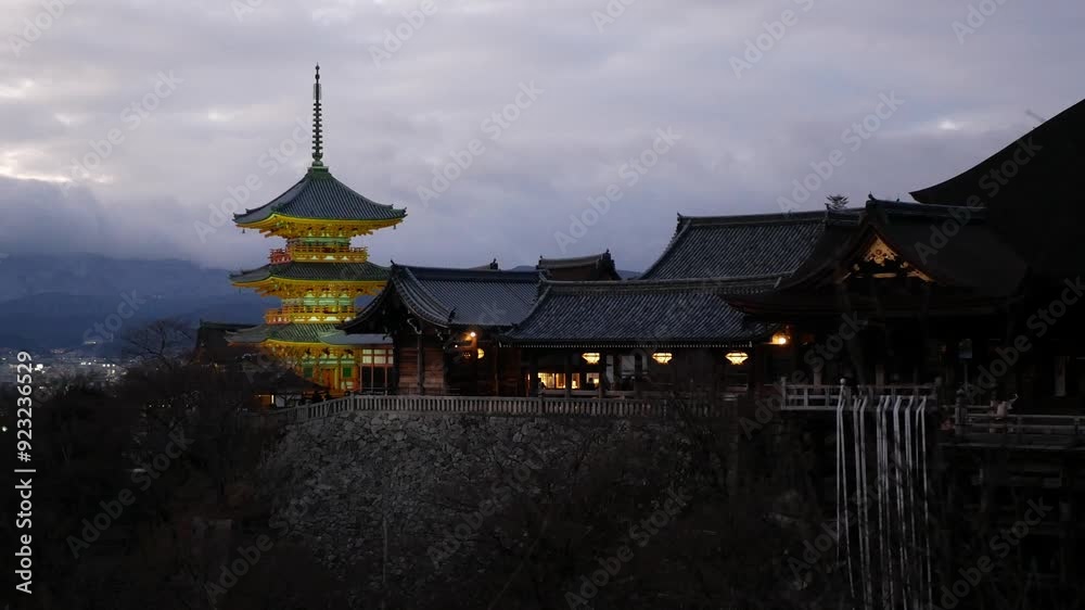landscape view to Pagoda in Kyoto ancient temple heritage site in dawn sunset time with backgrpund of kyoto downtown and mountain range,Famous Japanese Temple in Kyoto at Sunset time landscape view to Pagoda in Kyoto ancient temple heritage site in dawn sunset time with backgrpund of kyoto downtown and mountain range,Famous Japanese Temple in Kyoto at Sunset time
