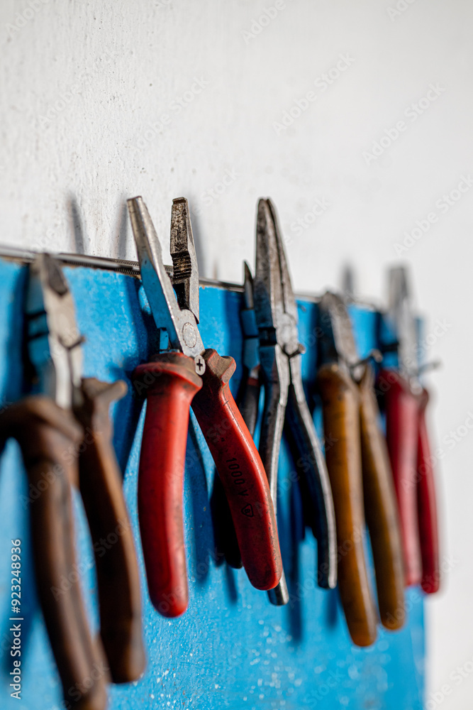 Closeup photo shoot of different nesessary tools and parts in every man's garage.Auto check up and car service shop concept.Different type of tools, especially wrenches. Closeup photo shoot of different nesessary tools and parts in every man's garage.Auto check up and car service shop concept.Different type of tools, especially wrenches.