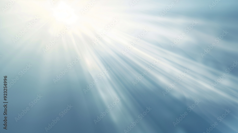 Bright sunbeams breaking through clouds in a serene sky. Bright sunbeams breaking through clouds in a serene sky.