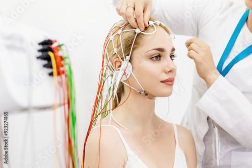 Female patient undergoing an EEG test, showcasing modern healthcare and patient comfort. Perfect for highlighting advanced diagnostic technology and patient-centered care.