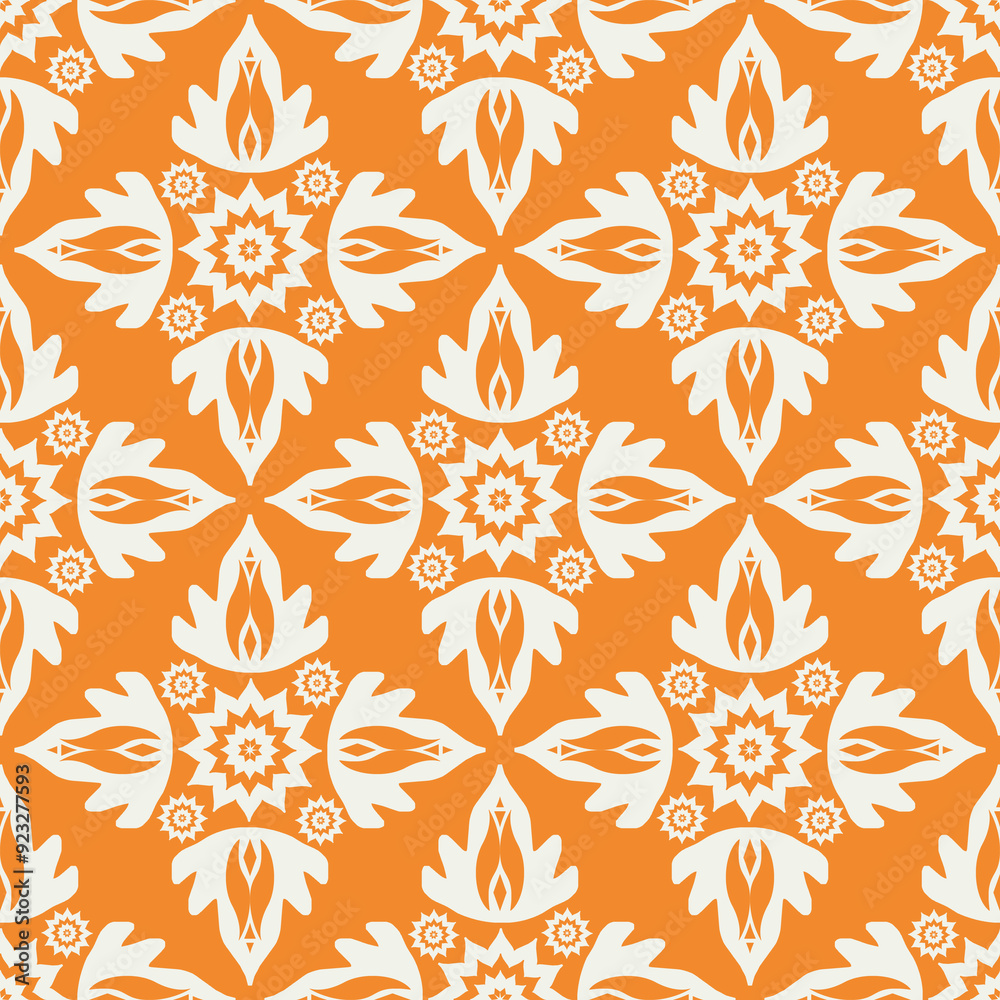 Fototapeta premium colorful ethnic motif seamless pattern for wallpaper and textile on orange background.