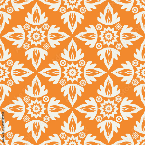 colorful ethnic motif seamless pattern for wallpaper and textile on orange background.