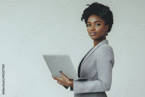  Confident Businesswoman with Laptop in Modern Office