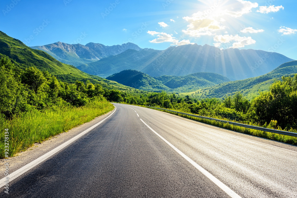 Fototapeta premium Asphalt road through mountains background