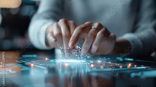 Hands interact with a virtual learning icon projecting educational content onto the environment.