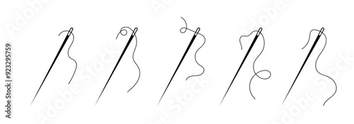 Needle with thread on a white background.