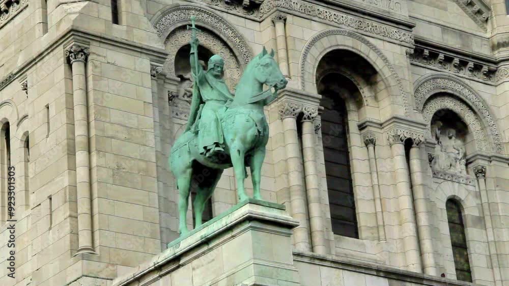 Bronze equestrian statue outside the Sacre Coeur Basilica. Bronze equestrian statue outside the Sacre Coeur Basilica.