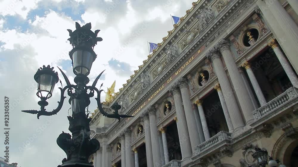 Partial view in low-angle shooting of the facade of the National Opera of Paris. Partial view in low-angle shooting of the facade of the National Opera of Paris.