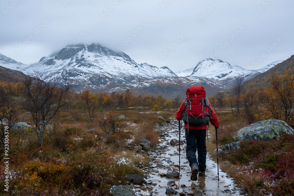 Hikers Climbing Snowy Mountain in Cold Weather Hikers Climbing Snowy Mountain in Cold Weather