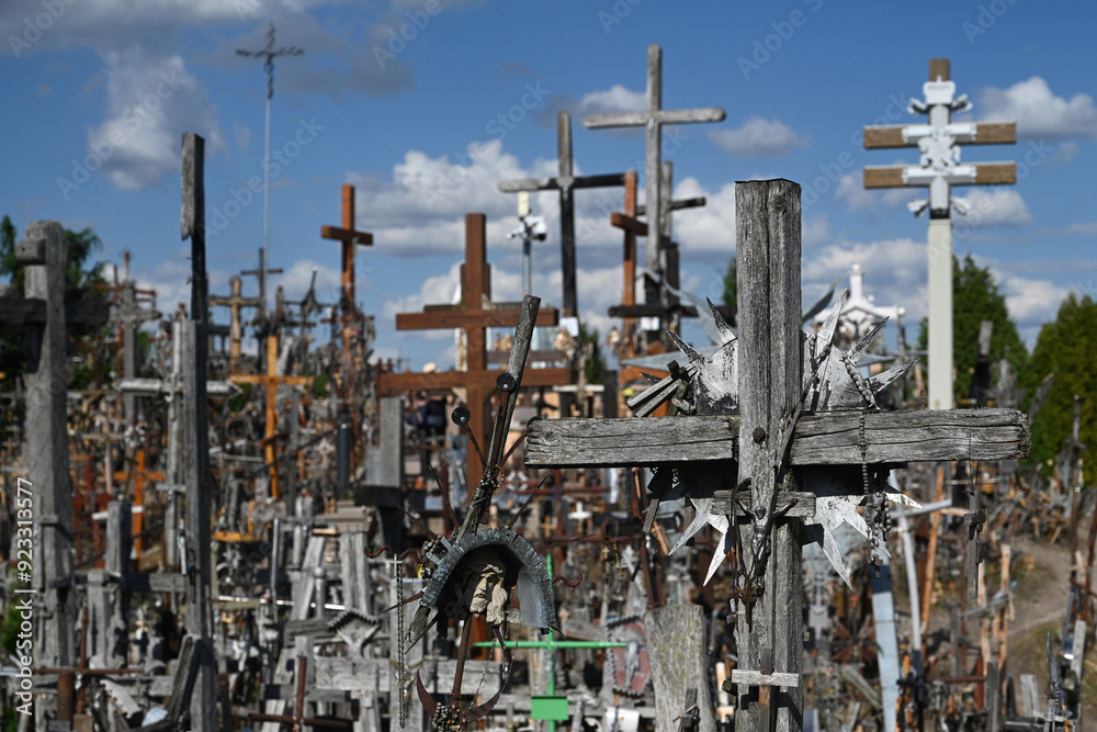 Fototapeta premium Siauliai, Lithuania - July 22, 2024: Hill of Crosses (Kryziu kalnas). .Hill of Crosses is a major site of Catholic pilgrimage in Lithuania.