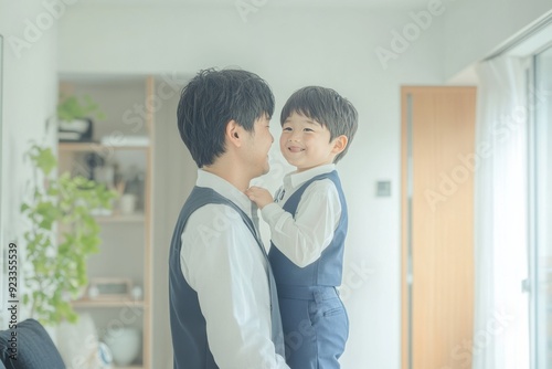 An Asian father take care his son to school, sharing smiles and creating cherished memories along the way.