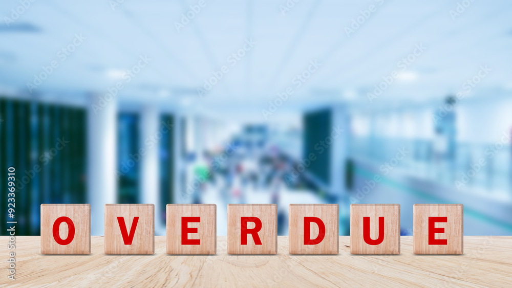 Overdue, Wooden on the office desk, informative and communication background, Word OVERDUE made with wood building blocks, OVERDUE word on block concept. Overdue, Wooden on the office desk, informative and communication background, Word OVERDUE made with wood building blocks, OVERDUE word on block concept.