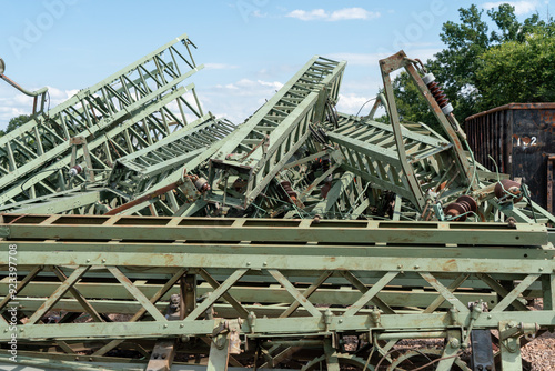 Zur Verschrottung gelagerte Oberleitungsmasten photo