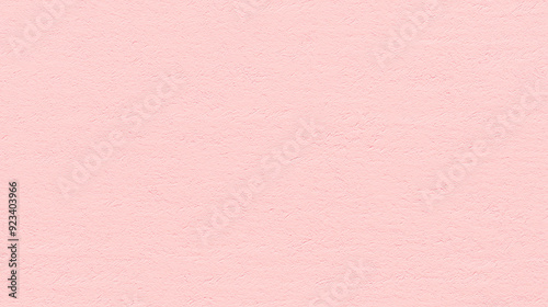 A texture background of slightly textured soft pink color paper, showcasing a mid-level granularity that mimics the look of colored construction paper