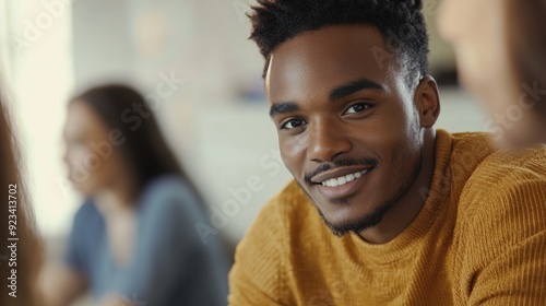 Happy African American Man in Casual Clothing Smiling at the Camera