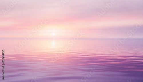 Serene sunset over calm waters with gentle hues in the sky