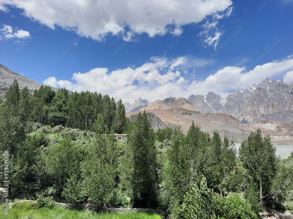 Beautiful view of the Passu Cones. The Passu Cones are a mountain range in Gilgit Baltistan, Pakistan. They are called Passu Cones because of their conical shape. Beautiful view of the Passu Cones. The Passu Cones are a mountain range in Gilgit Baltistan, Pakistan. They are called Passu Cones because of their conical shape.