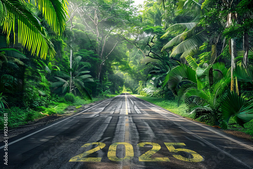 empty Road through jungle with yellow text 2025 on the asphalt, new year concept