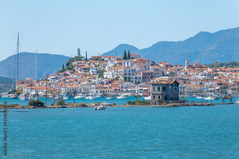 Greece Peloponnese region Poros island and Galatas town seaside sailing boats on the blue sea Greece Peloponnese region Poros island and Galatas town seaside sailing boats on the blue sea