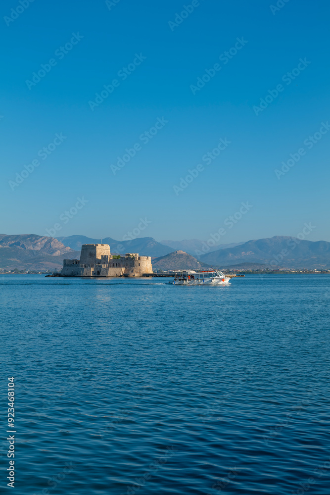 Naklejka premium greece old capital nafplion streets shops churches castle and colorful houses quiet hours tourist destination