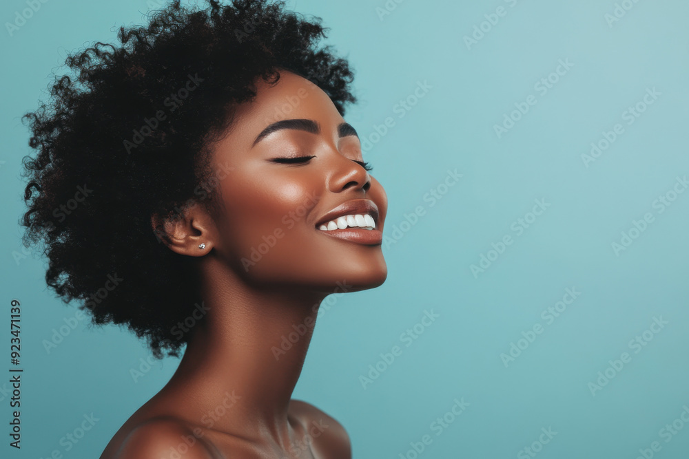 A close up of a black woman's face with her eyes closed A close up of a black woman's face with her eyes closed
