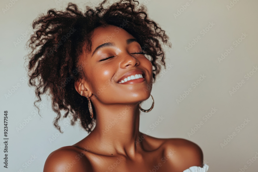 A close up of a black woman's face with her eyes closed A close up of a black woman's face with her eyes closed