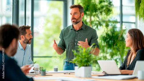 Visionary architect presenting a sustainable design to a diverse team, using clear and confident communication to lead the discussion, architect, sustainable design, leadership, in photo