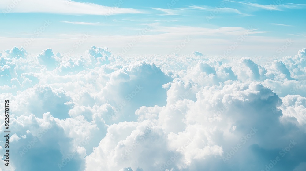 Fototapeta premium Serene Blue Sky with Fluffy Clouds