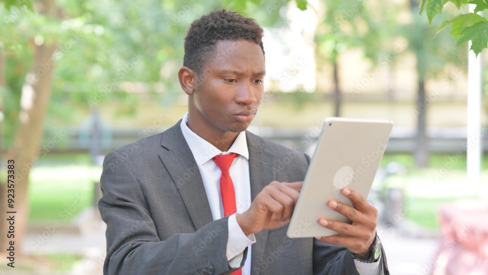 Portrait of African Businessman Using Tablet Outdoor Portrait of African Businessman Using Tablet Outdoor