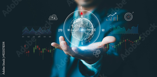 Photos Businessman with compass navigator and market research, planning for business so