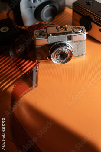 Vintage Camera on Orange Surface