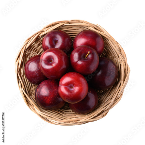 Red plum fruit in basket, top view