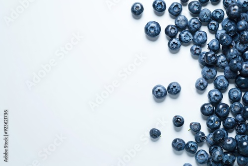 Bluberries top view on white background. Summer berries template empty background.