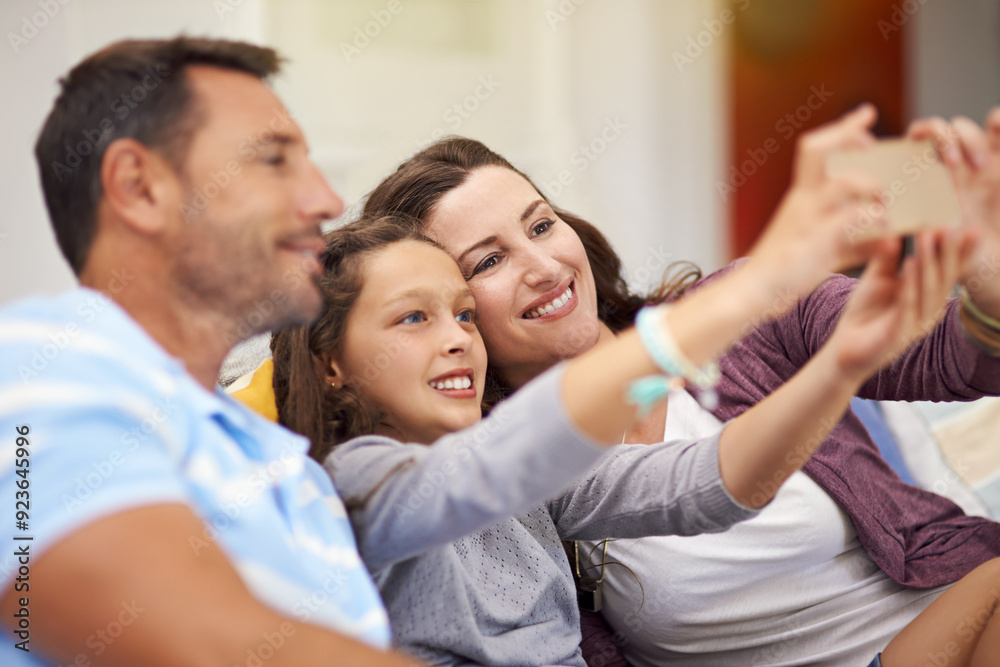 Fototapeta premium Selfie, home and parents with girl on couch, happiness and bonding together in living room. Family, house and mother with father, daughter and picture with break, relax and capture with app and smile