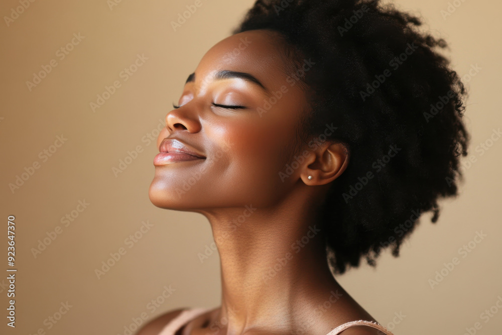 A close up of a black woman's face with her eyes closed A close up of a black woman's face with her eyes closed