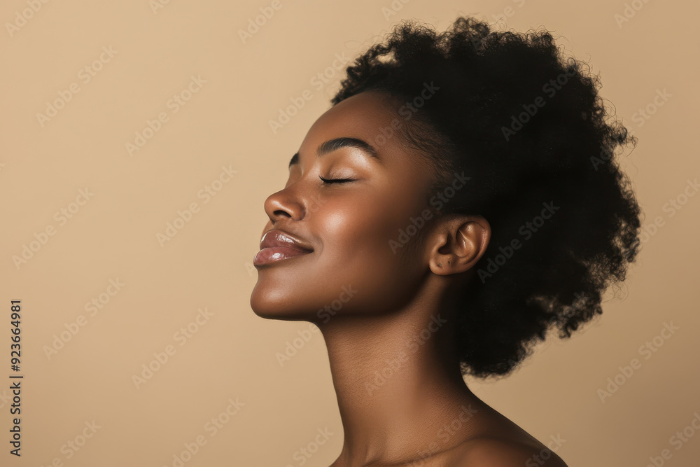 A close up of a black woman's face with her eyes closed A close up of a black woman's face with her eyes closed
