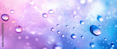 Wallpaper Mural This vibrant image displays water droplets delicately placed on a gradient background of pastel hues, creating a refreshing and visually soothing scene. Torontodigital.ca