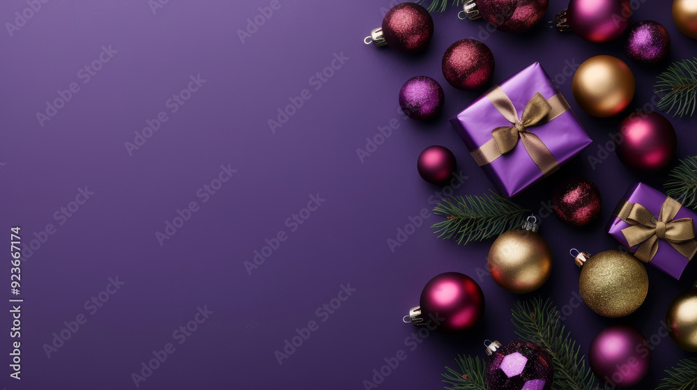 Purple and gold ornaments and wrapped gifts scattered on a deep violet background Purple and gold ornaments and wrapped gifts scattered on a deep violet background