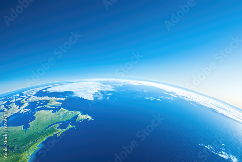 A stunning view of Earth from space, showcasing the vibrant blue oceans and green landmasses under a clear blue sky.